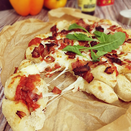 Photo of our tearn and share style pizza